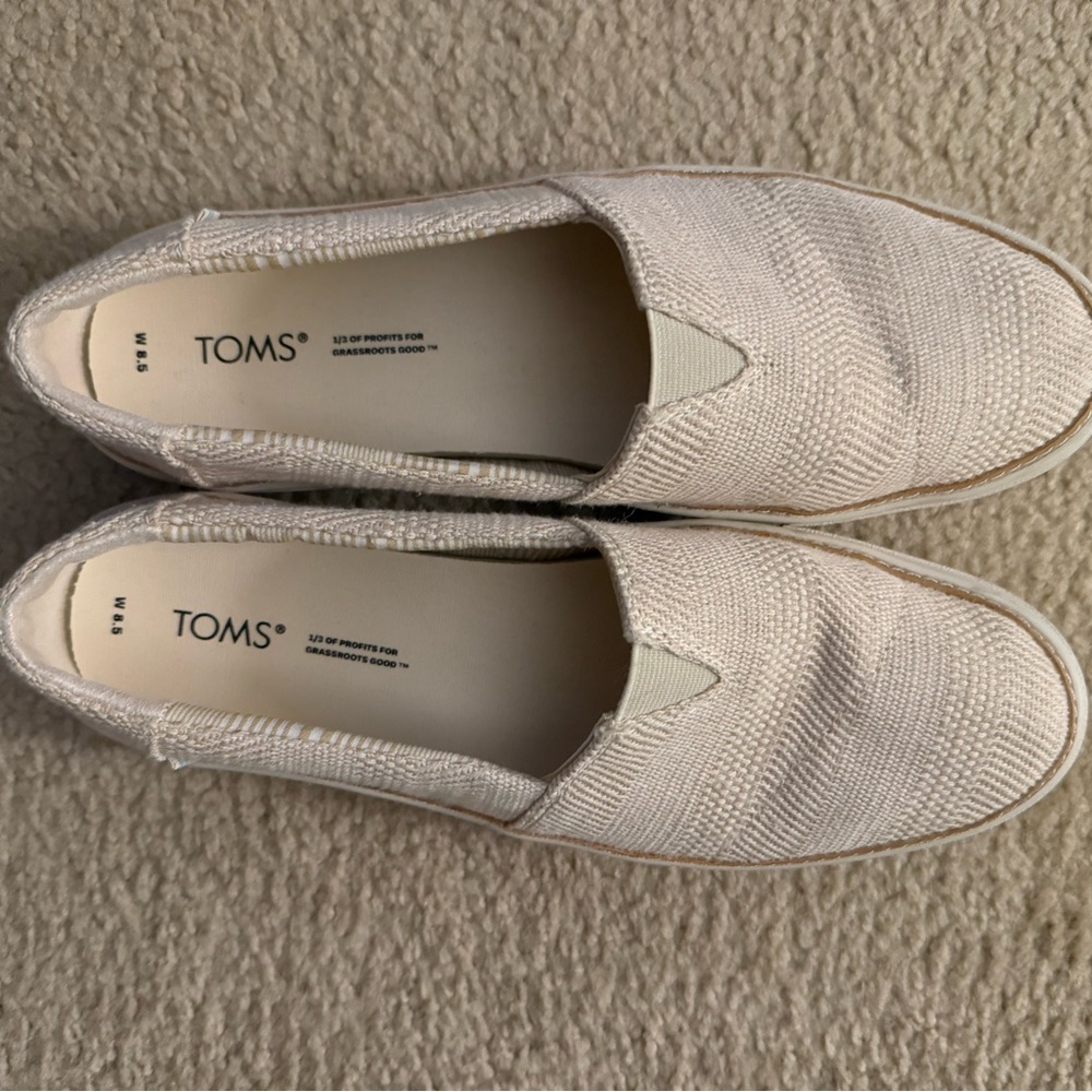TOMS Beige and White Striped Slip-Ons